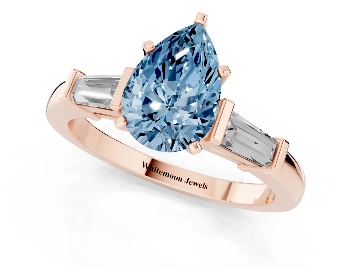 Fancy Blue Pear Cut Cut Diamond Solitaire Ring with Tapered Baguette Accents and Four-Prong Setting Rose gold