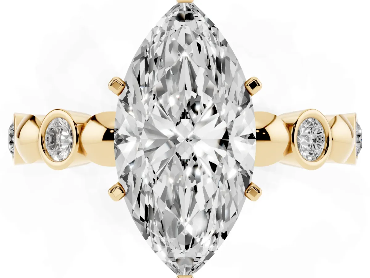 Marquise Cut Solitaire Bezel-Set Diamond Ring with Beaded Band and Four-Prong Setting Yellow gold