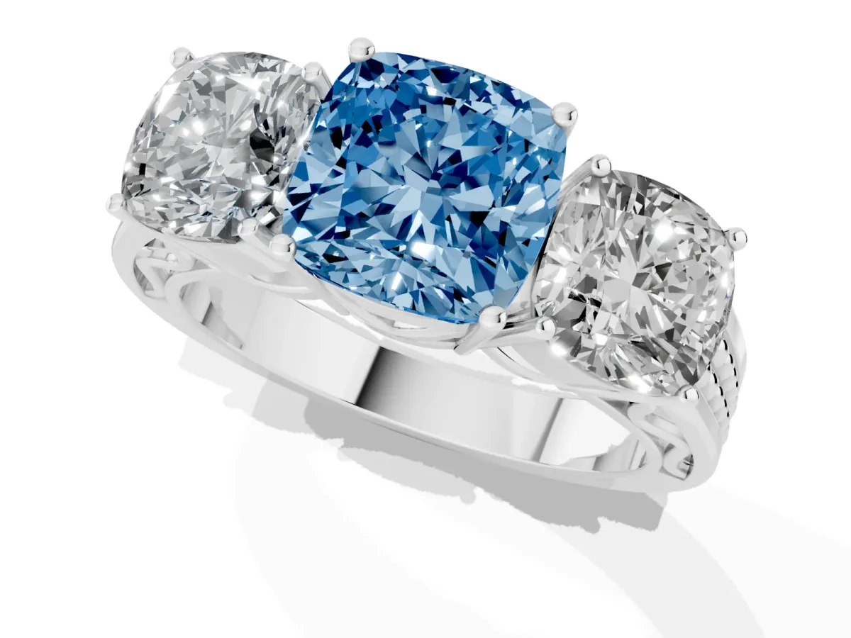 Fancy Blue Cushion Cut Diamond Three-Stone Ring with Prong Setting and Textured Band Platinum