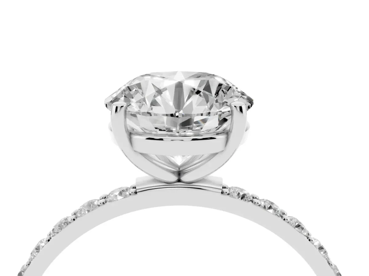 Round Cut Diamond Solitaire Ring with Round Pavé Shoulders and Prong Setting Platinum