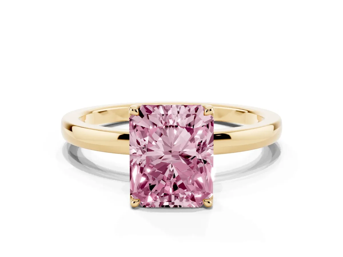 Fancy Pink Radiant Cut Diamond Solitaire Ring with Thin Band and Prong Setting Yellow gold
