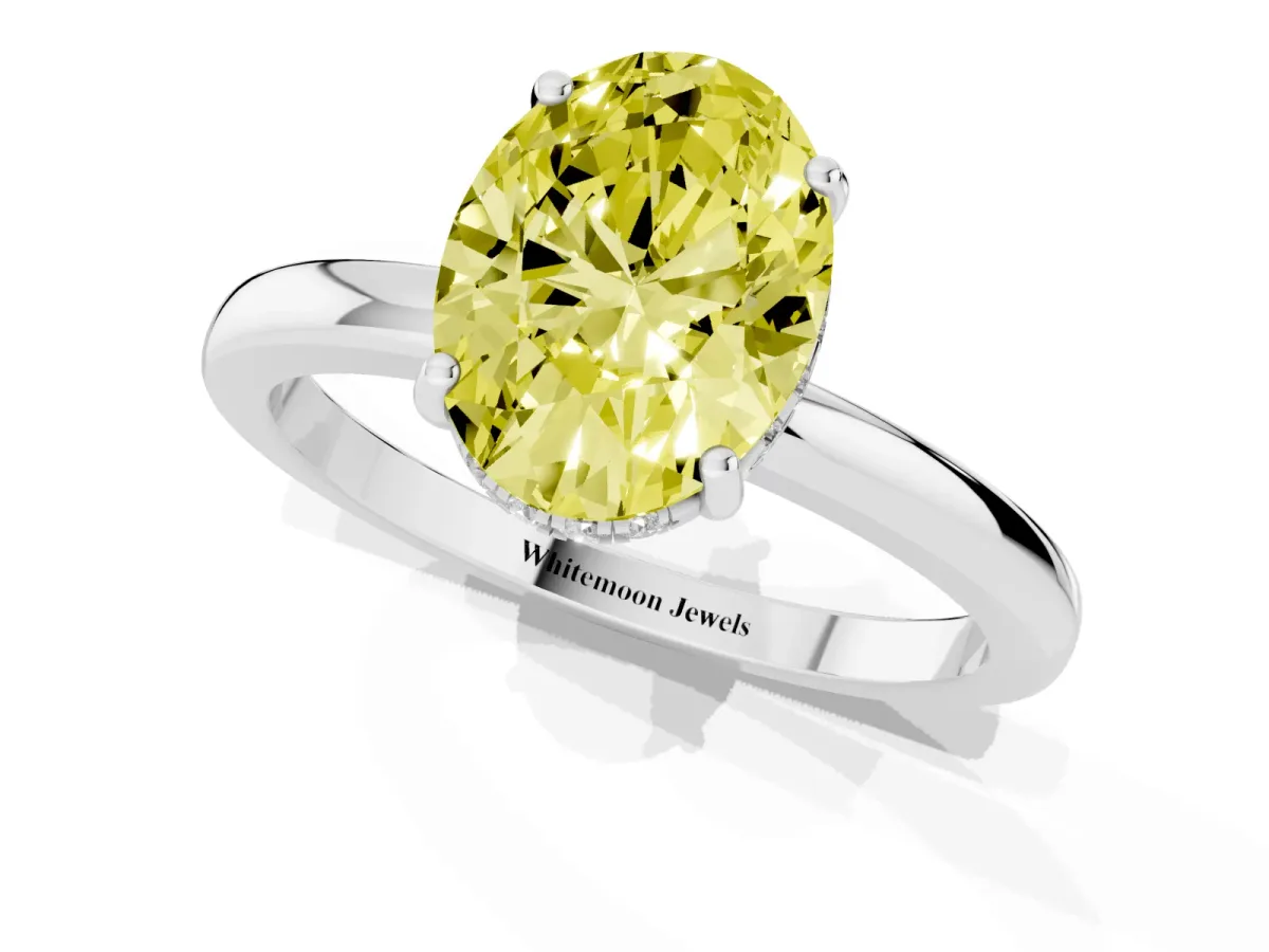 Fancy Yellow Oval Cut Solitaire Diamond Ring with Prong Setting and Plain Band Silver
