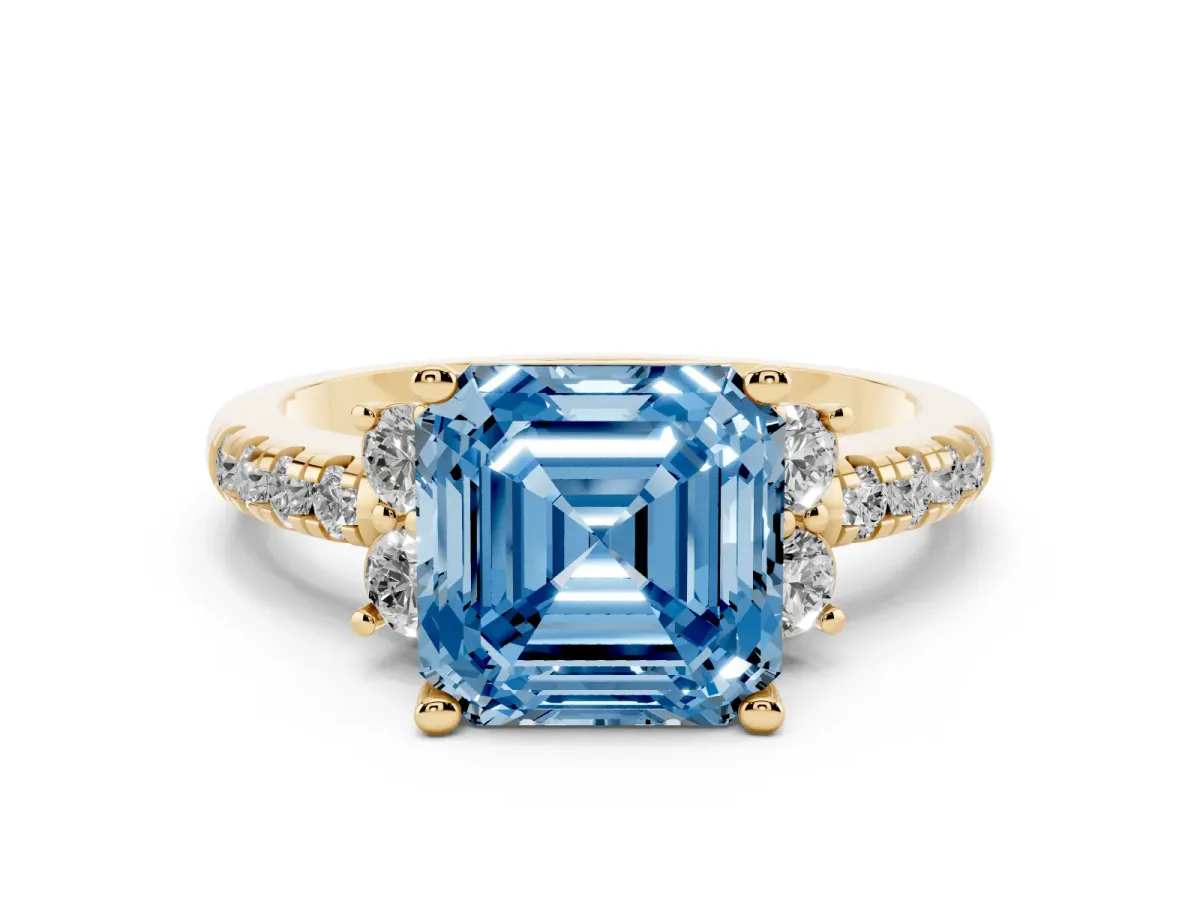 Fancy Blue Asscher Cut Diamond Three-Stone Pave Band with Four-Prong Setting Yellow gold