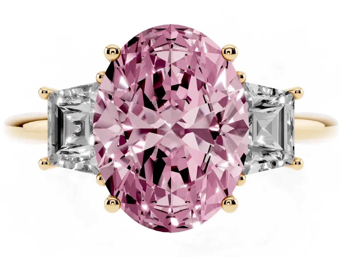 Fancy Pink Oval Cut Diamond Three-Stone Ring with Trapezoid Side Stones and Prong Setting Yellow gold