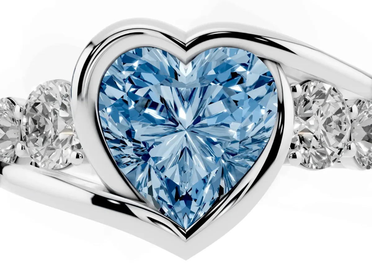 Fancy Blue Bezel Set Heart Cut Diamond Bypass Ring with Round Accents Platinum