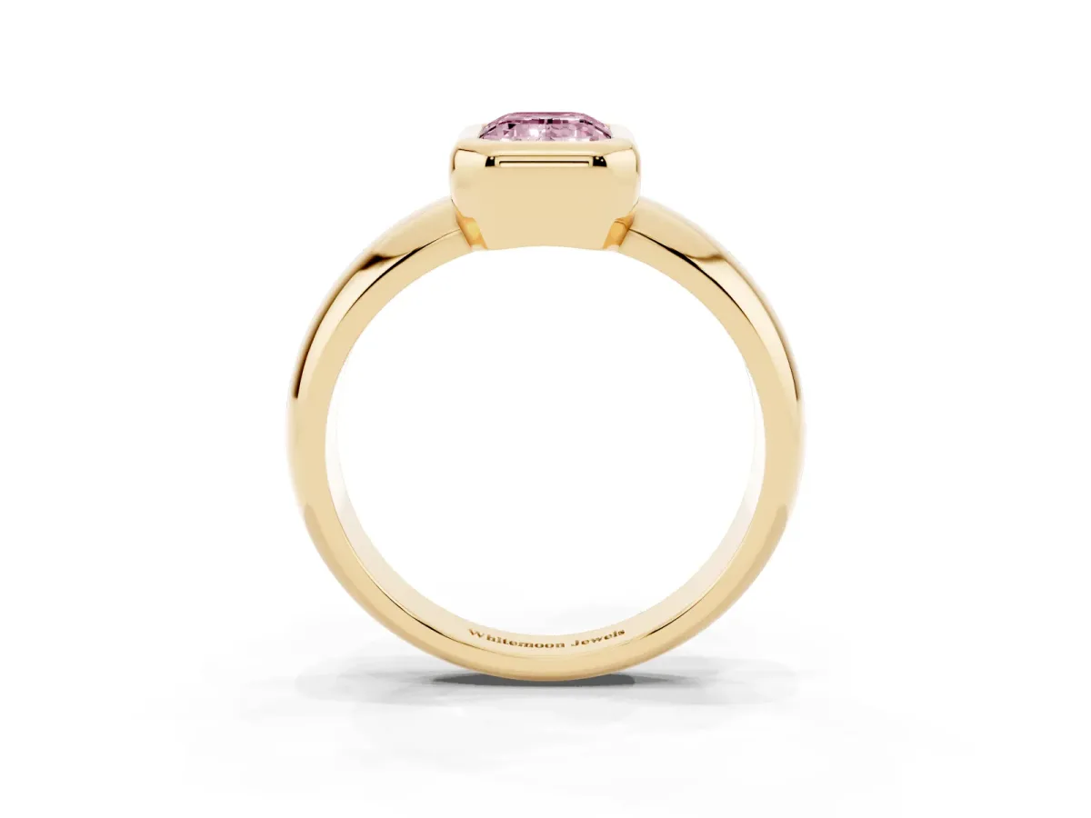Fancy Pink Bezel Set Emerald Cut Solitaire Ring with Wide Band Yellow gold