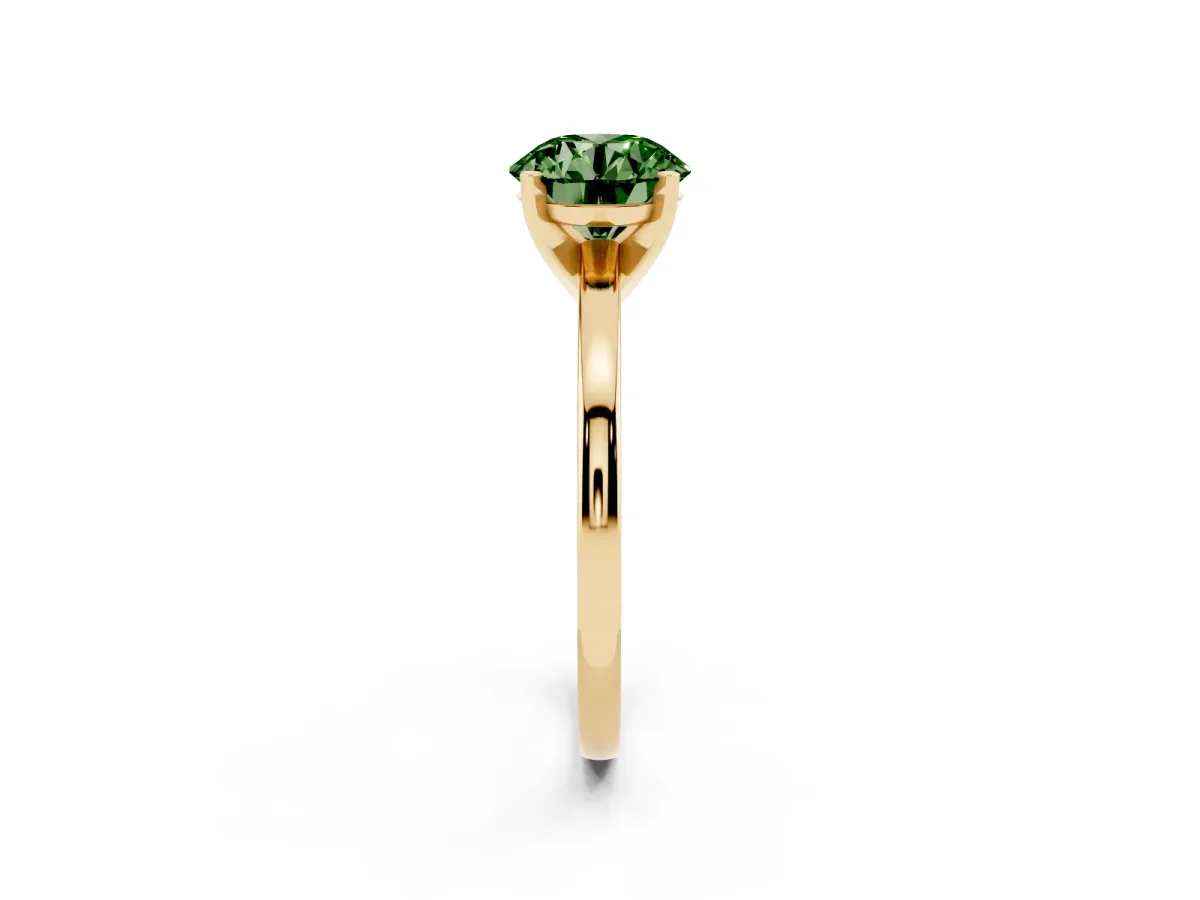 Fancy Green Round Cut Solitaire Diamond Engagement Ring with Four-Prong Setting on a Classic Band Yellow gold
