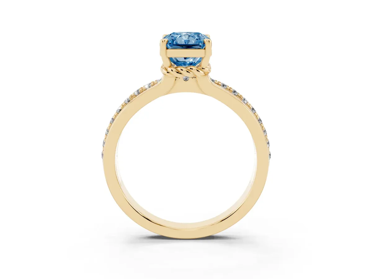 Fancy Blue Radiant Cut Solitaire Diamond Ring with Channel Set Band and Six-Prong Setting Yellow gold
