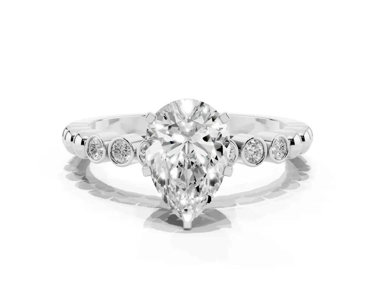 Pear Cut Solitaire Bezel Accent Diamond Engagement Ring with Beaded Band and Four-Prong Setting Platinum