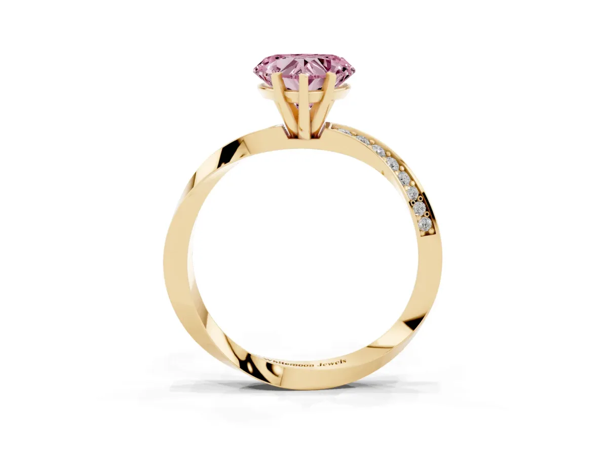 Fancy Pink Heart Cut Diamond Engagement Ring with Side Stone Accents and Four-Prong Setting Yellow gold