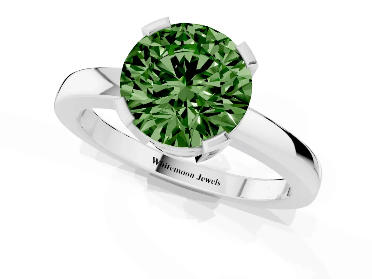 Fancy Green Round Cut Cut Solitaire Ring with Four-Prong Setting and Classic Band Silver