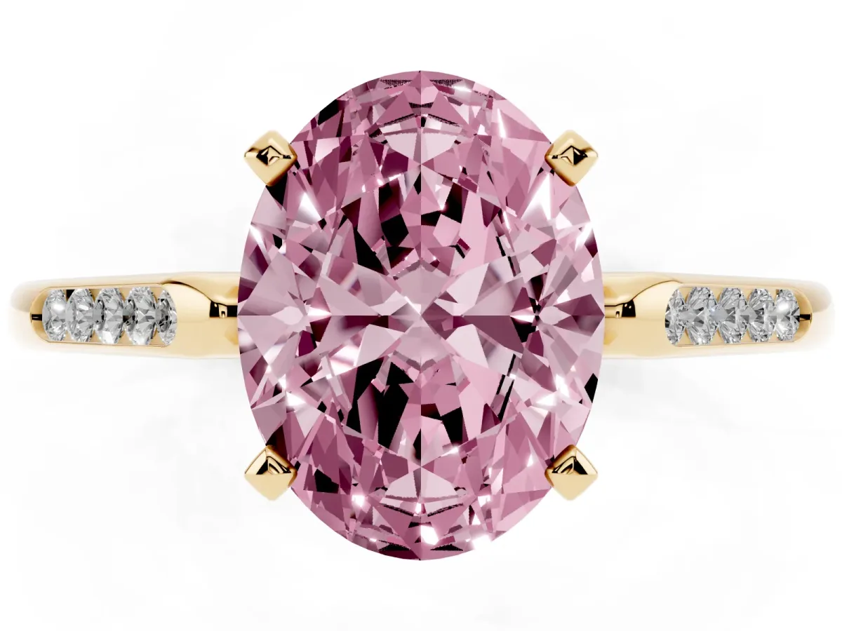 Fancy Pink Oval Cut Diamond Solitaire Ring with Channel Set Round Band and Prong Setting Yellow gold