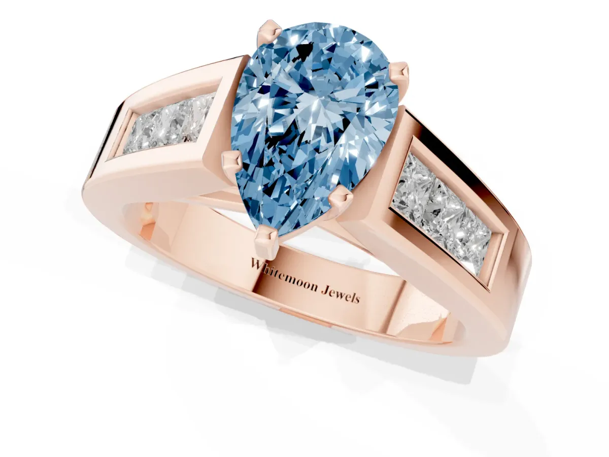 Fancy Blue Pear Cut Cut Channel Set Solitaire Ring with Four-Prong Setting Rose gold