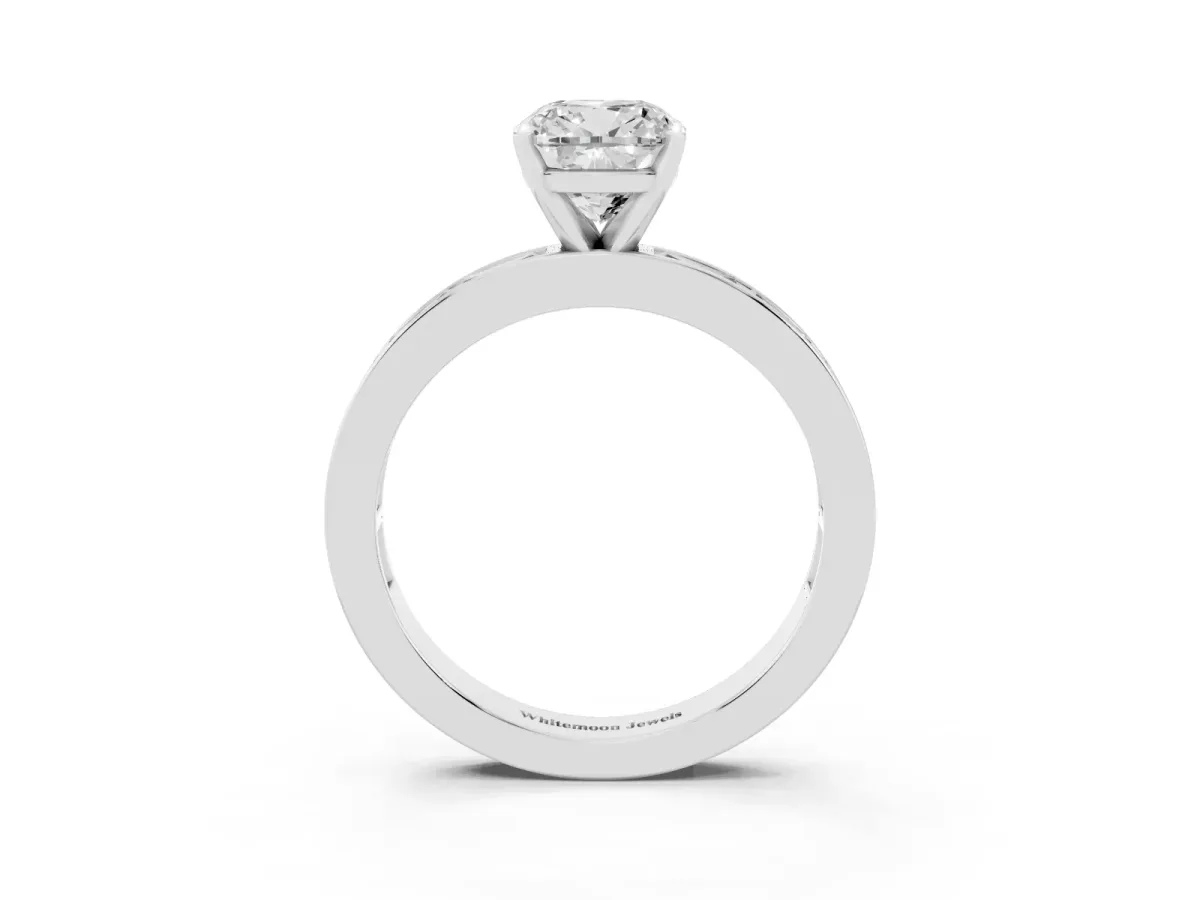 Cushion Cut Solitaire Diamond Ring with Channel-Set Baguette Band and Four-Prong Setting Platinum
