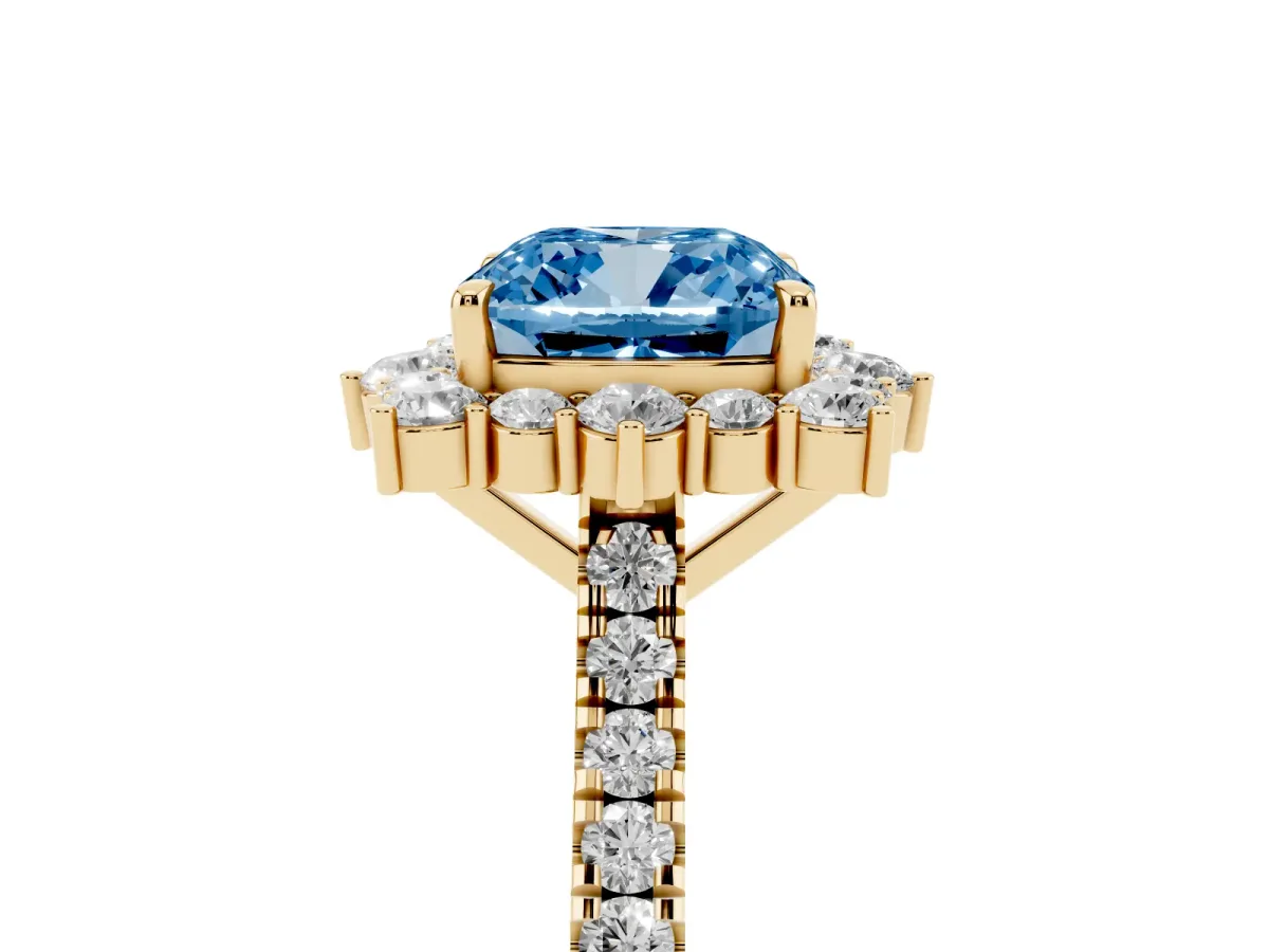 Fancy Blue Cushion Cut Halo Diamond Ring with Pavé Band and Prong Setting Yellow gold