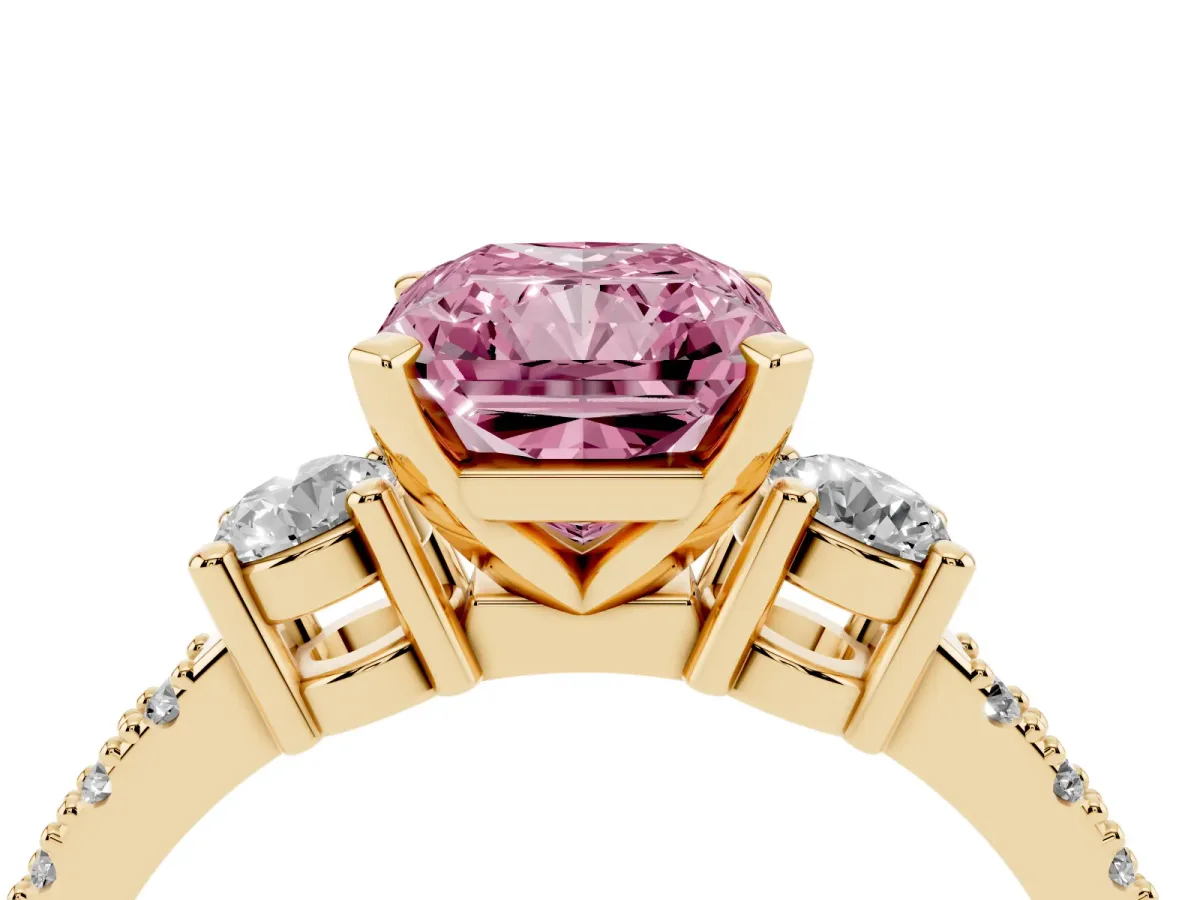 Fancy Pink Radiant Cut Three-Stone Diamond Pavé Band with Prong Setting Yellow gold