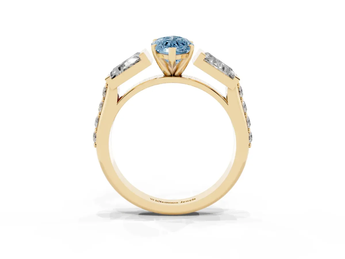 Fancy Blue Marquise Cut Diamond Engagement Ring with Baguette Side Stones and Channel Set Band Yellow gold