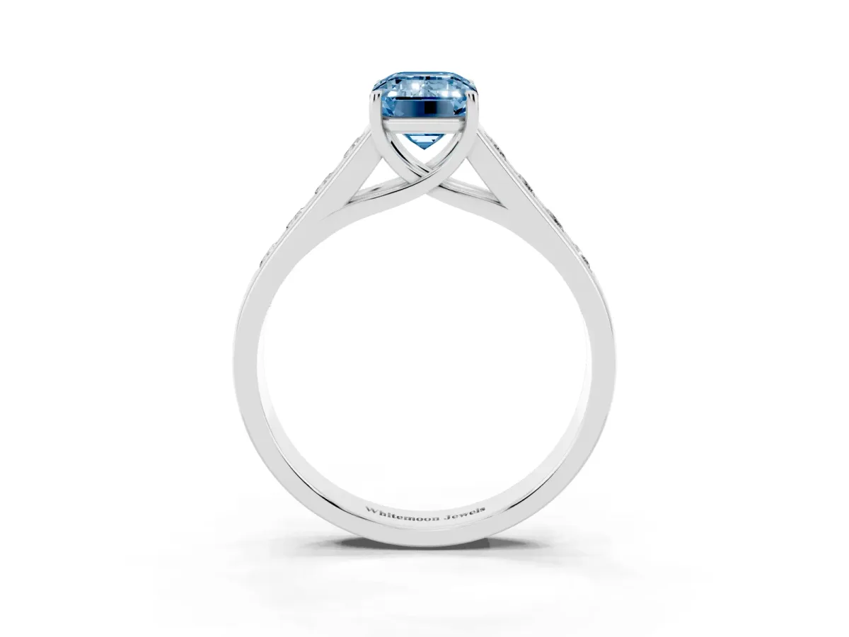 Fancy Blue Emerald Cut Solitaire Channel-Set Diamond Engagement Ring with Four-Prong Setting Silver
