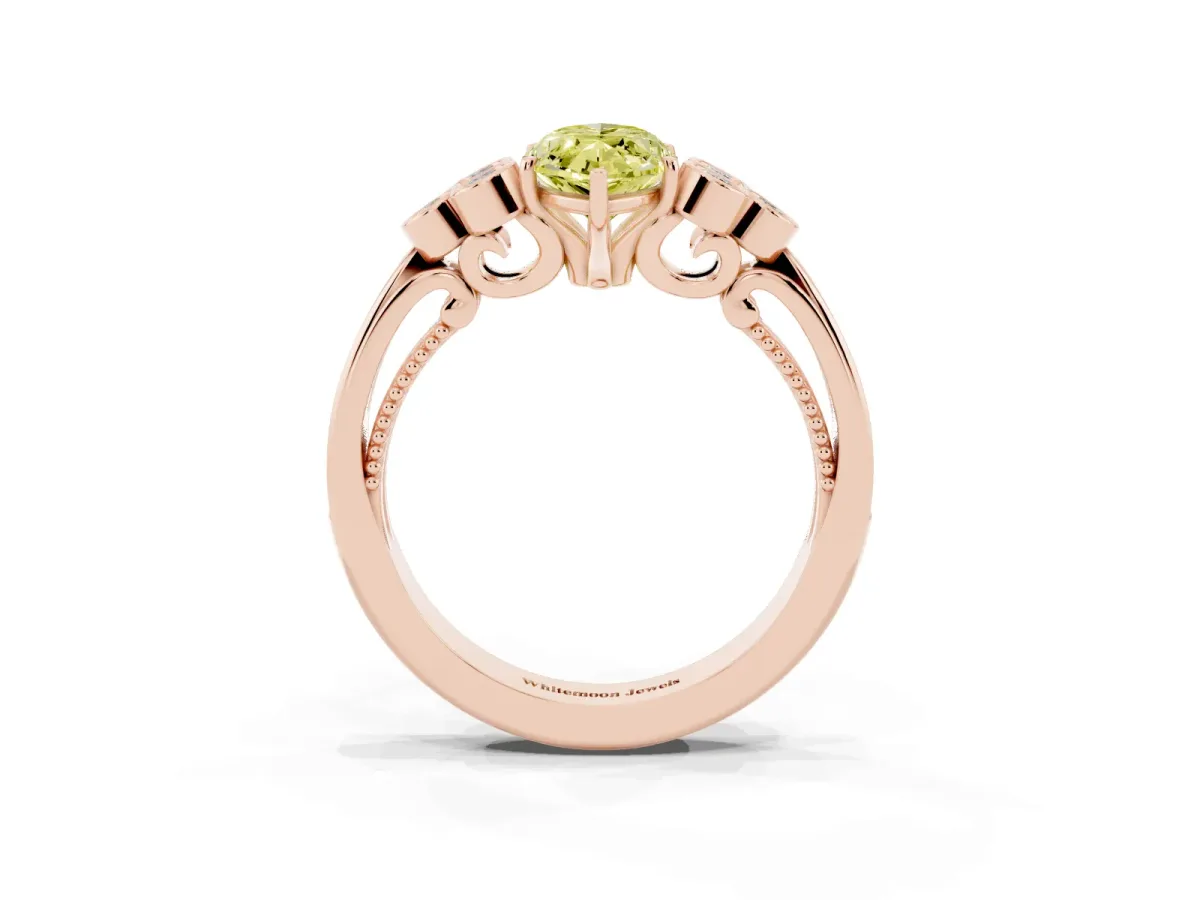 Fancy Yellow Marquise Cut Cut Diamond Engagement Ring with Bezel Set Round Side Stones and Prong Setting Rose gold