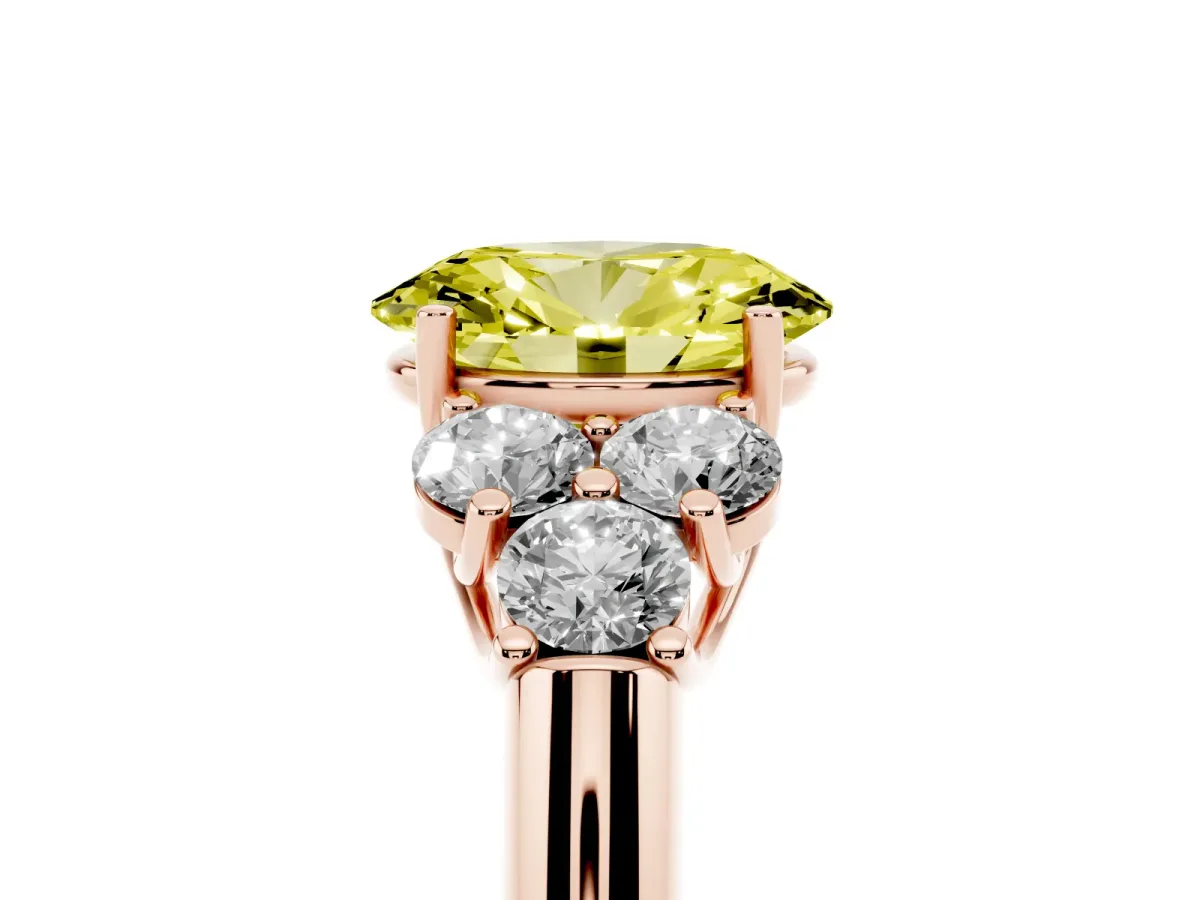 Fancy Yellow Oval Cut Cut Diamond Cluster Ring with Round Accent Stones and Prong Setting on a Classic Band Rose gold