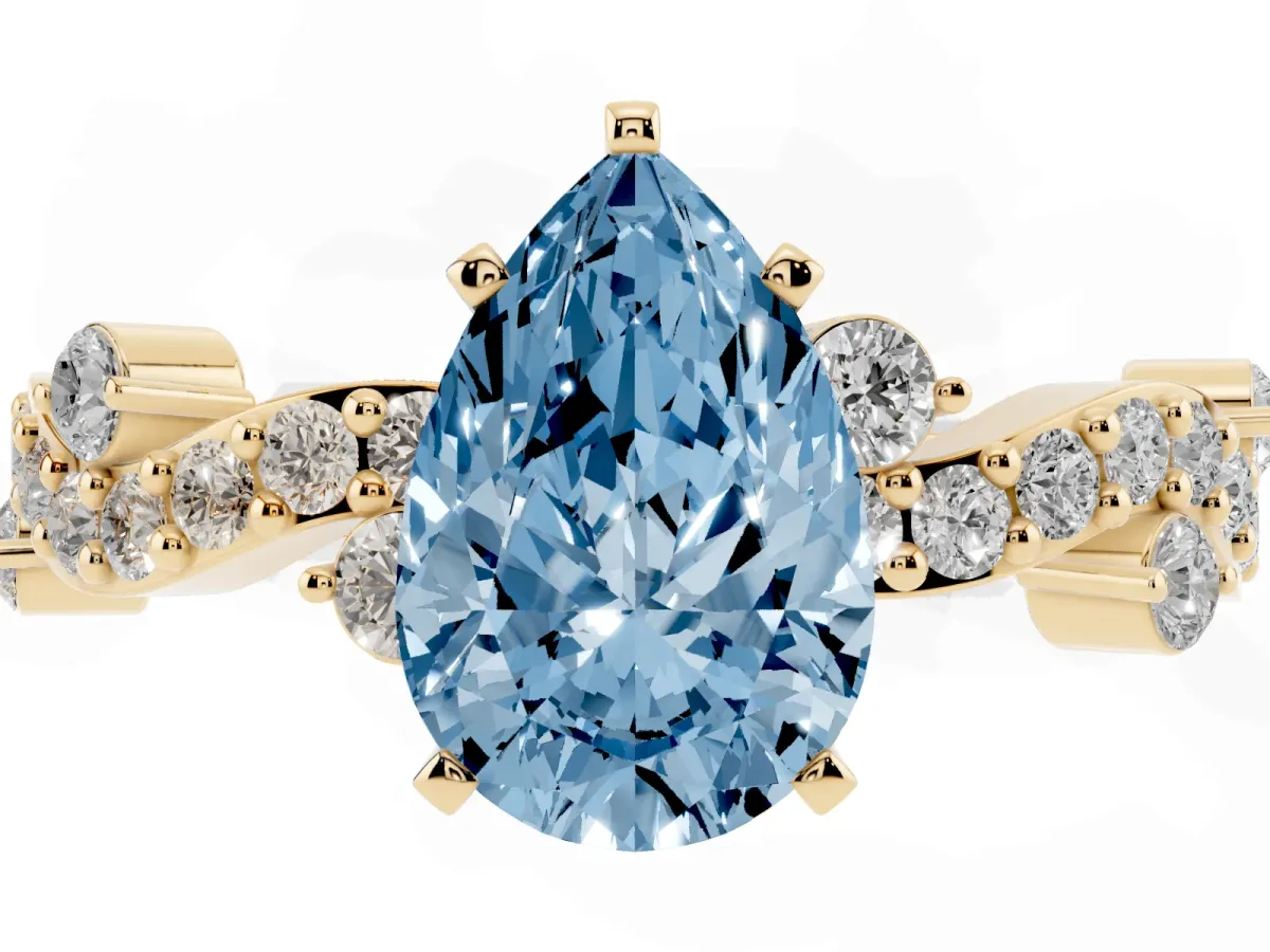 Fancy Blue Pear Cut Cut Solitaire Diamond Twisted Band with Pave Setting Yellow gold