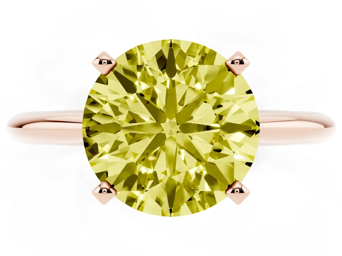 Fancy Yellow Round Cut Cut Solitaire Ring with Four-Prong Setting on a Classic Band Rose gold