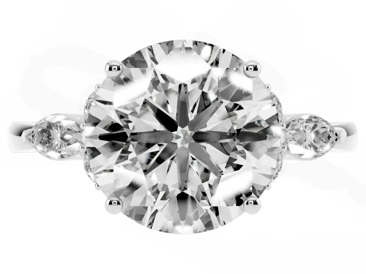 Round Cut Brilliant Diamond Solitaire Ring with Pear Side Stones and Four-Prong Setting Silver