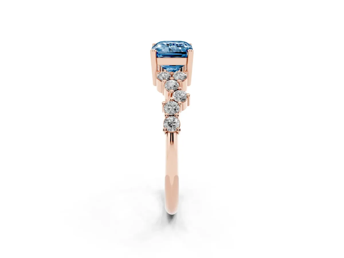 Fancy Blue Emerald Cut Diamond Scattered Round Accent Ring with Prong Setting Rose gold