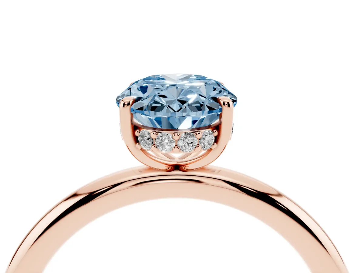 Fancy Blue Oval Cut Diamond Solitaire Ring with Thin Band and Four-Prong Setting Rose gold