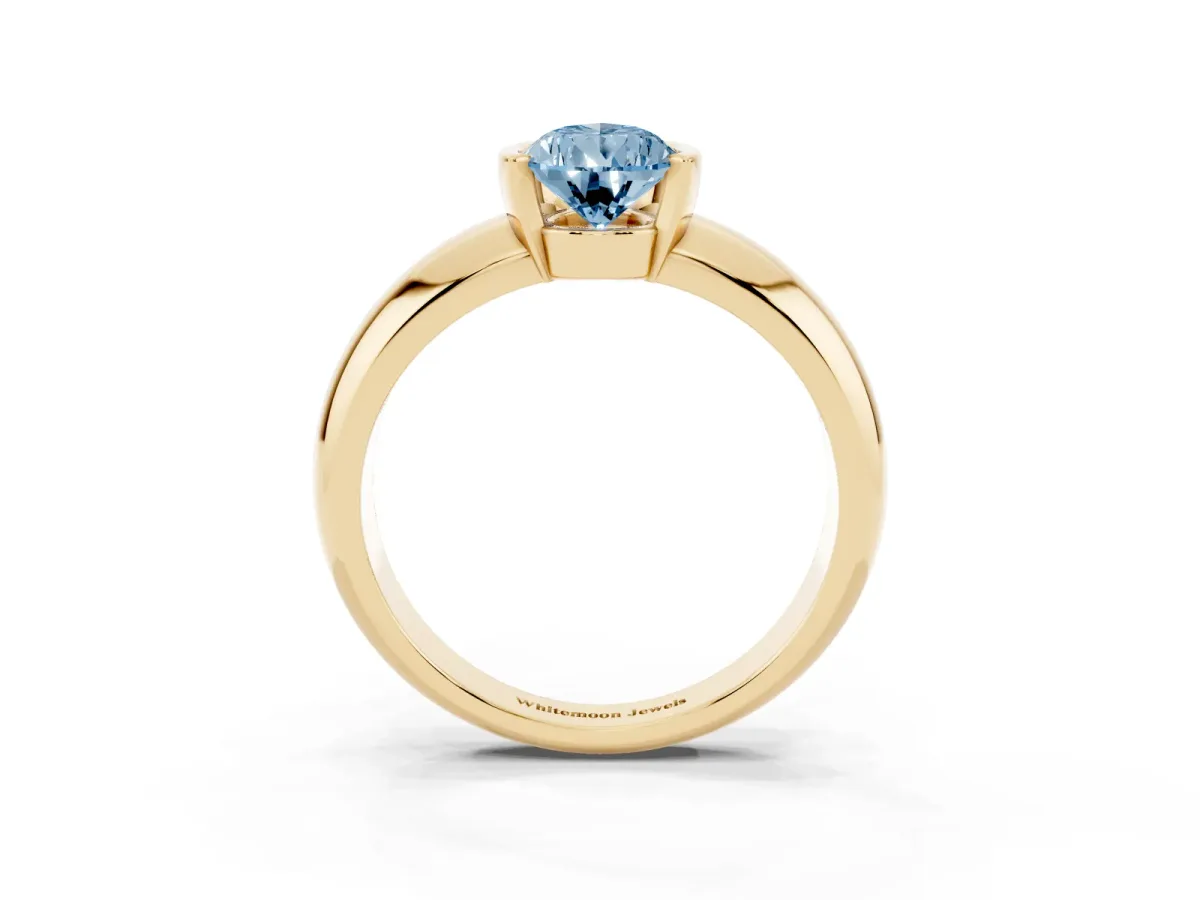 Fancy Blue Pear Cut Solitaire Tension Set Diamond Ring with Wide Band Yellow gold