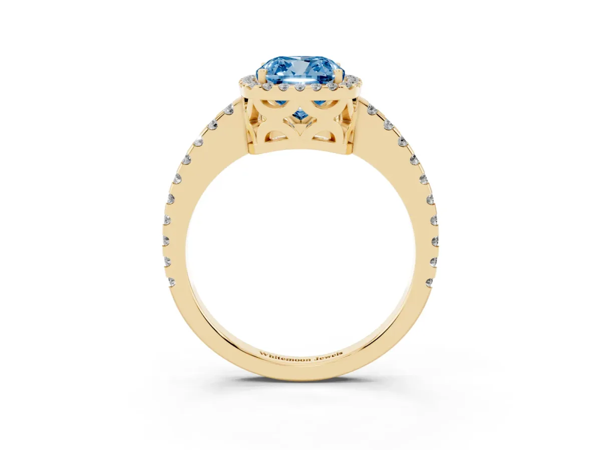 Fancy Blue Cushion Cut Diamond Halo Engagement Ring with Pavé Band and Prong Setting Yellow gold