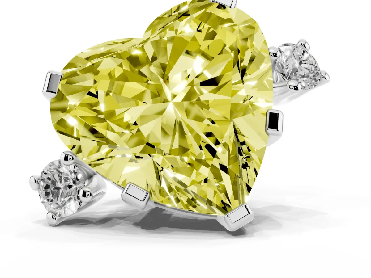 Fancy Yellow Heart Cut Cut Three-Stone Solitaire Ring with Round Accent Diamonds and Four-Prong Setting Silver