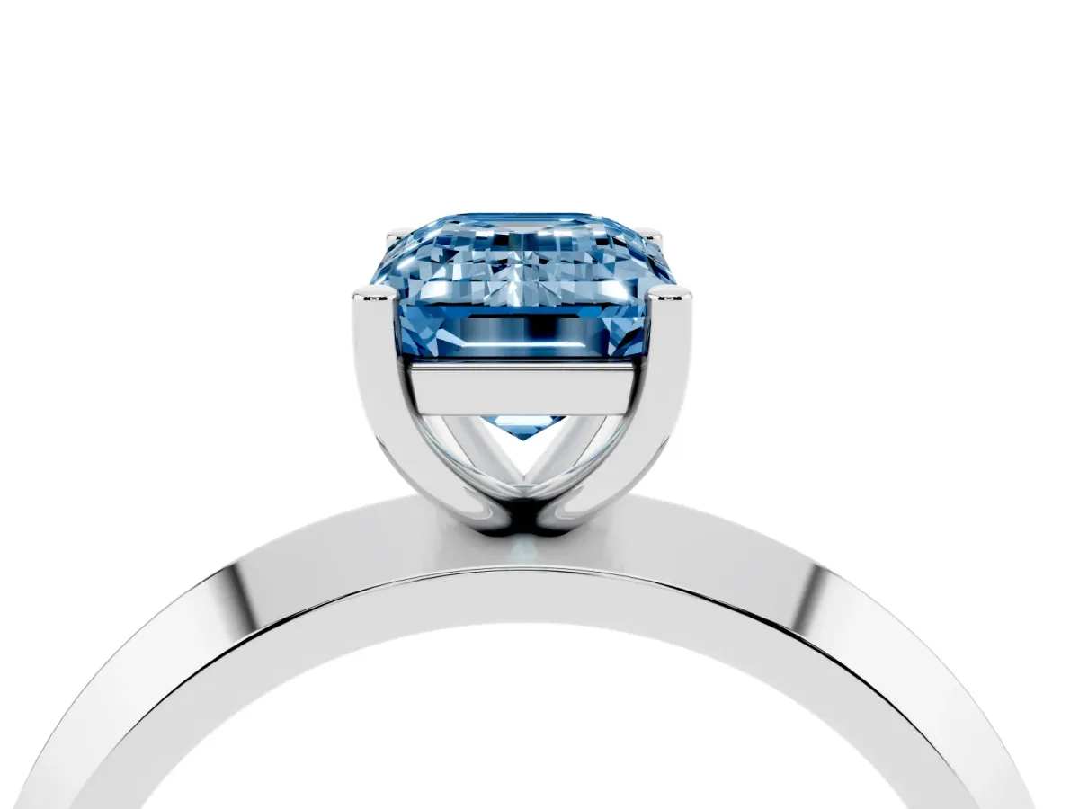 Fancy Blue Emerald Cut Cut Solitaire Engagement Ring with Flat Band and Four-Prong Setting Platinum