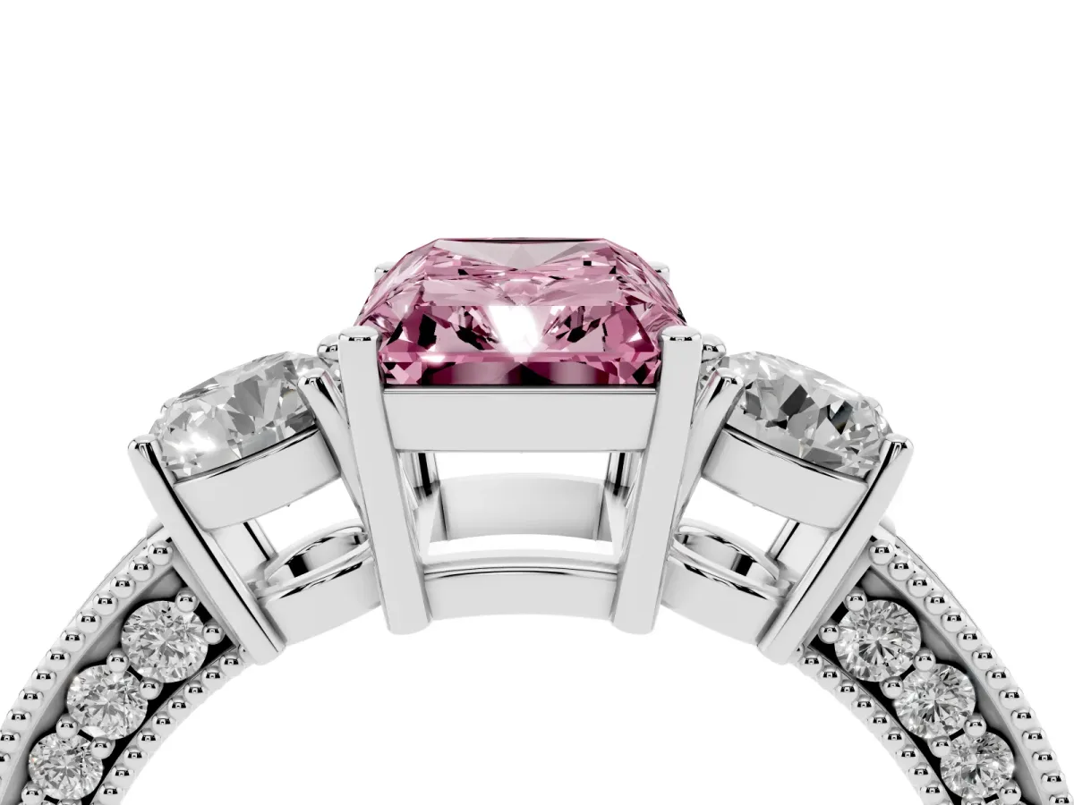 Fancy Pink Radiant Cut Three-Stone Diamond Ring with Pavé Band and Four-Prong Setting Silver
