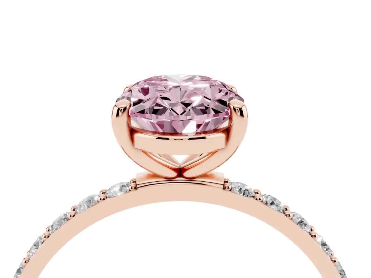 Fancy Pink Oval Cut Diamond Solitaire Ring with Round Pavé Band and Prong Setting Rose gold