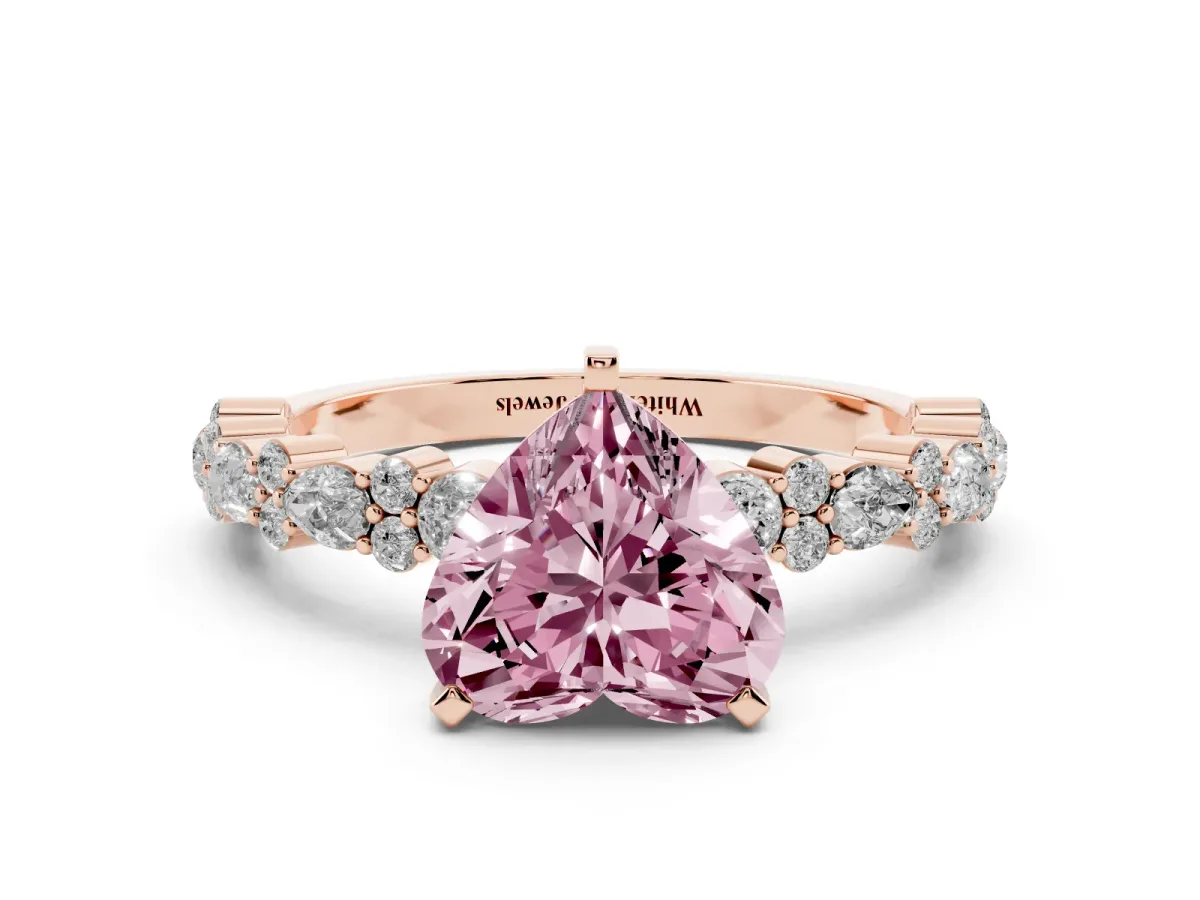 Fancy Pink Heart Cut Diamond Side Stone Solitaire Ring with Round and Four-Prong Setting Rose gold