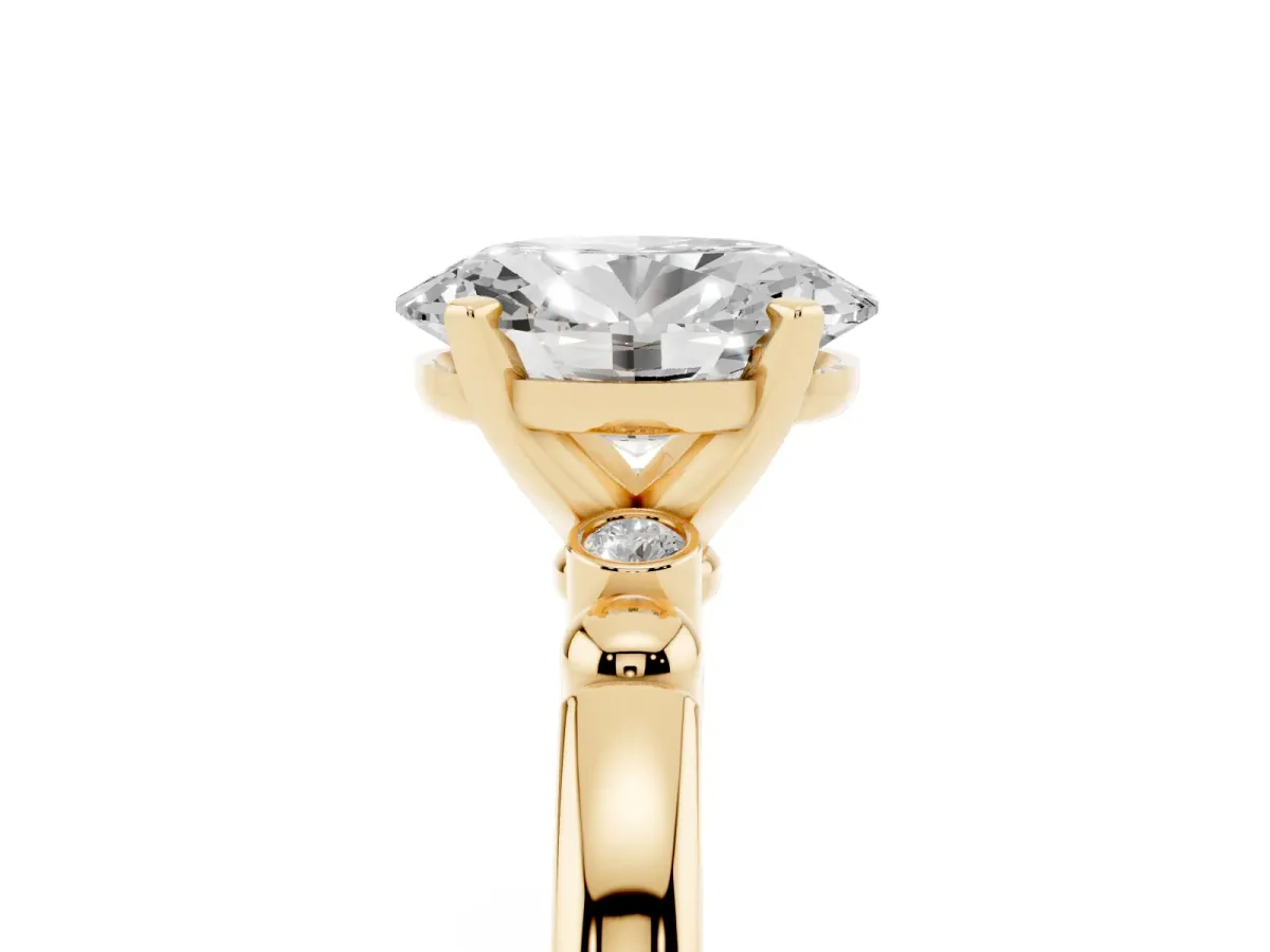 Oval Cut Solitaire Beaded Band with Four-Prong Setting Yellow gold