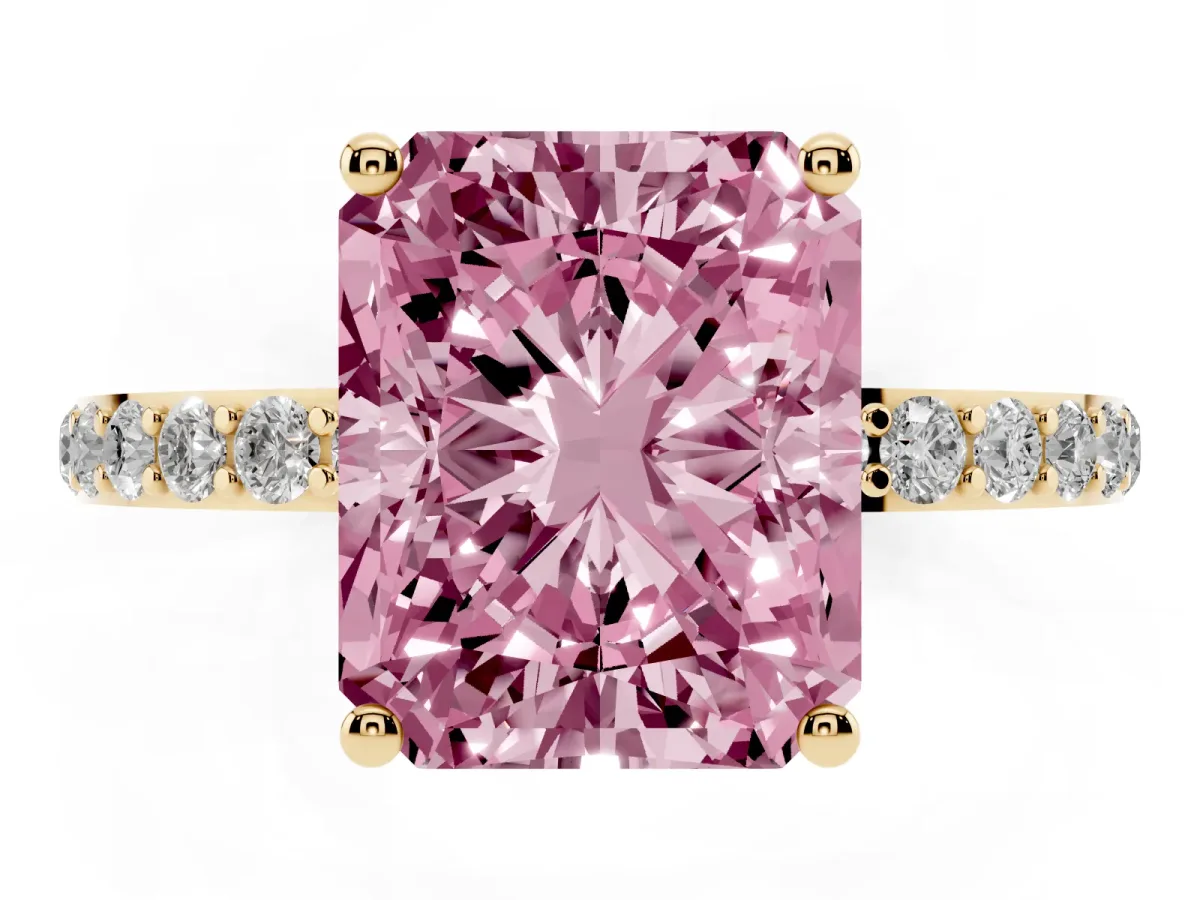 Fancy Pink Radiant Cut Diamond Solitaire Ring with Round Pavé Shoulders and Prong Setting Yellow gold