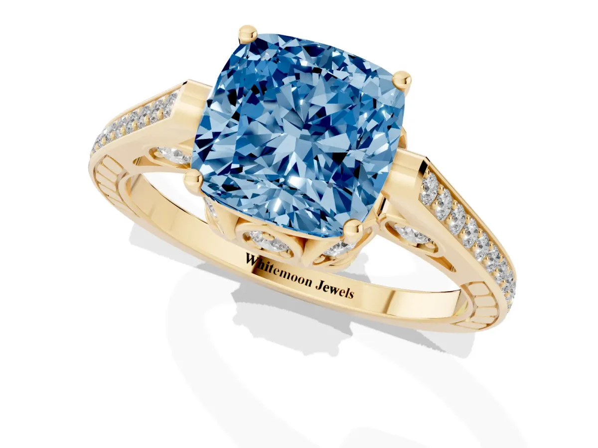 Fancy Blue Cushion Cut Cut Cathedral Pave Diamond Engagement Ring with Six-Prong Setting Yellow gold