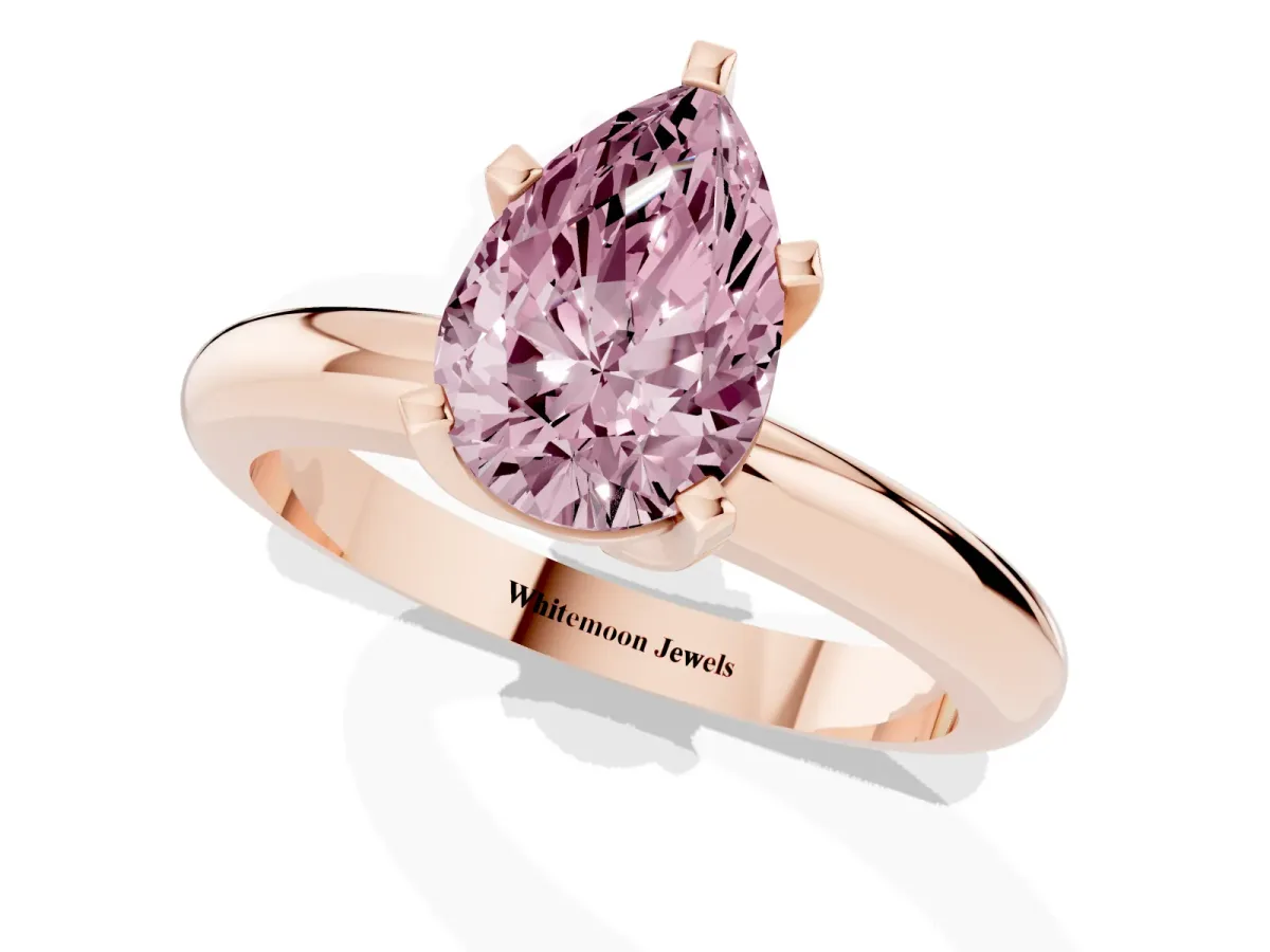 Fancy Pink Pear Cut Diamond Solitaire Engagement Ring with Round Band and Four-Prong Setting Rose gold