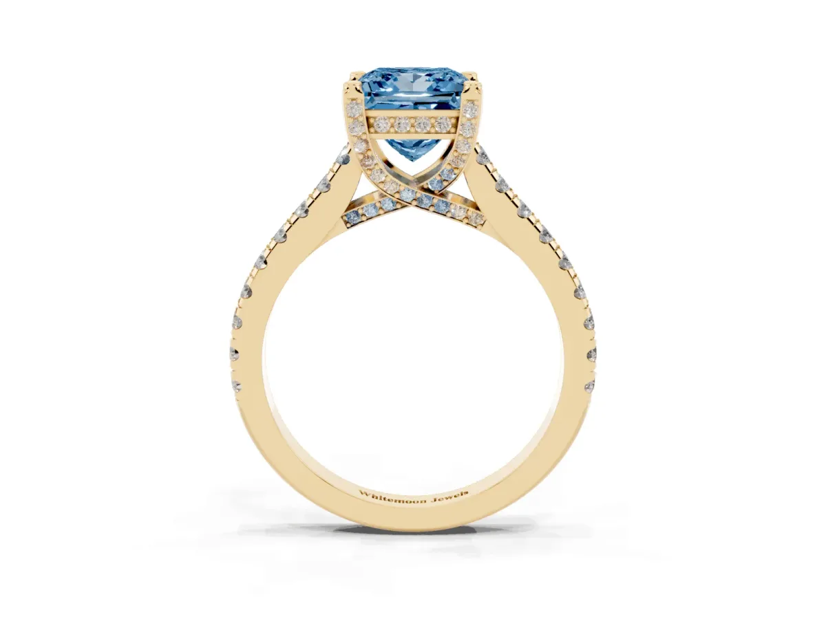Fancy Blue Princess Cut Brilliant Diamond Solitaire with Pavé Band and Four-Prong Setting Yellow gold