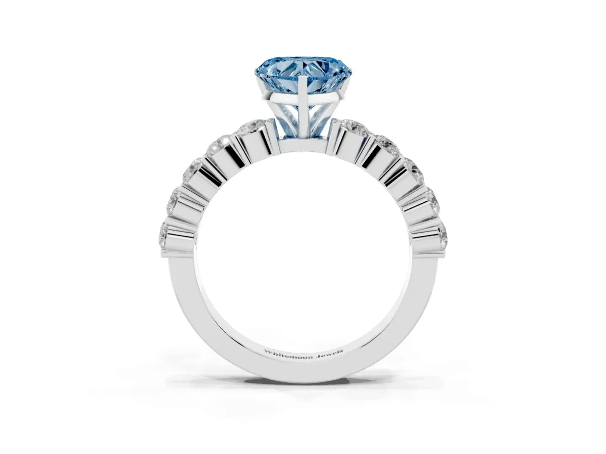 Fancy Blue Heart Cut Diamond Solitaire Ring with Shared Prong Round Side Stones White gold