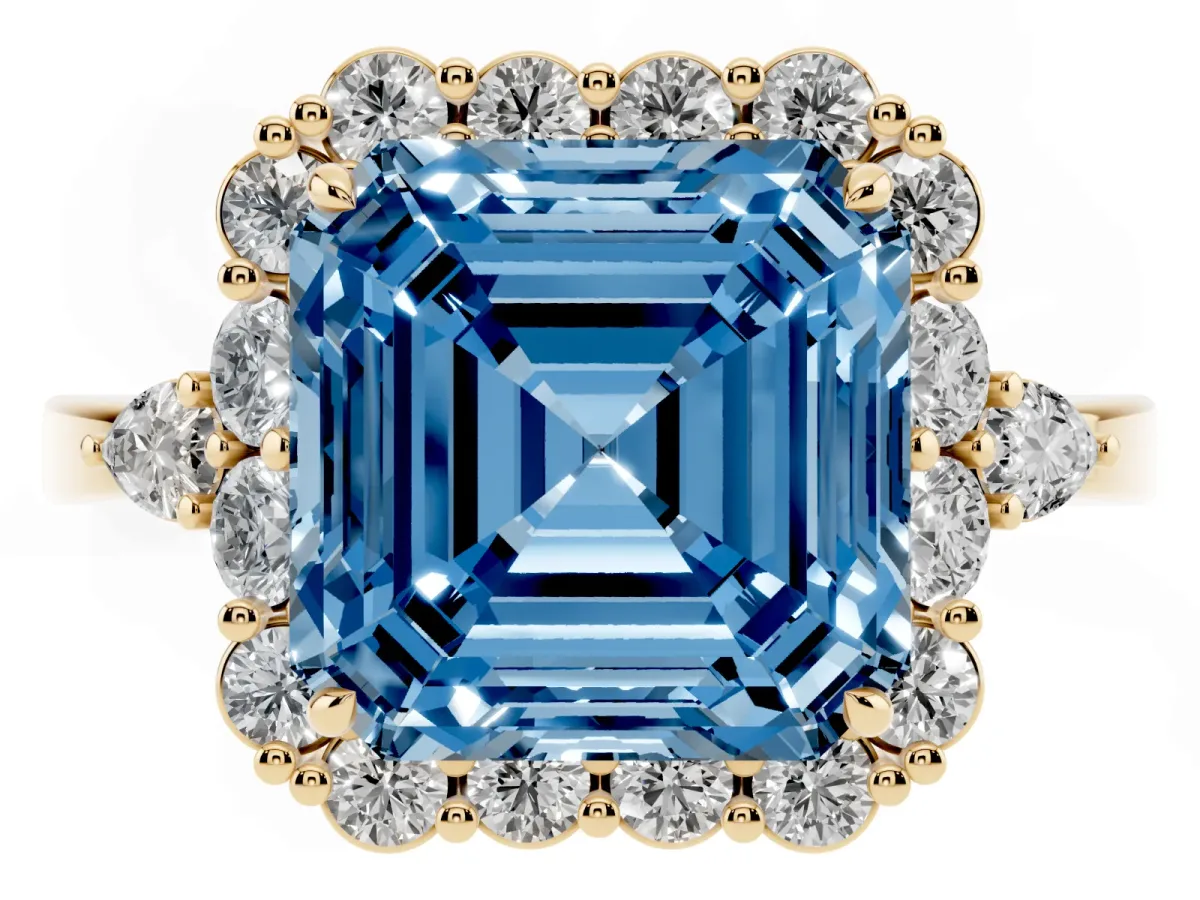 Fancy Blue Asscher Cut Diamond Halo Ring with Pear Side Stones and Prong Setting Yellow gold