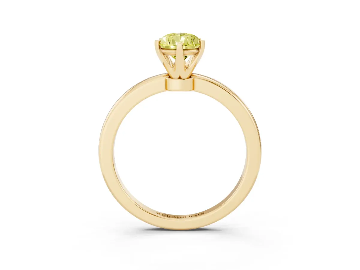 Fancy Yellow Pear Cut Solitaire Diamond Ring with Six-Prong Setting on a Classic Band Yellow gold
