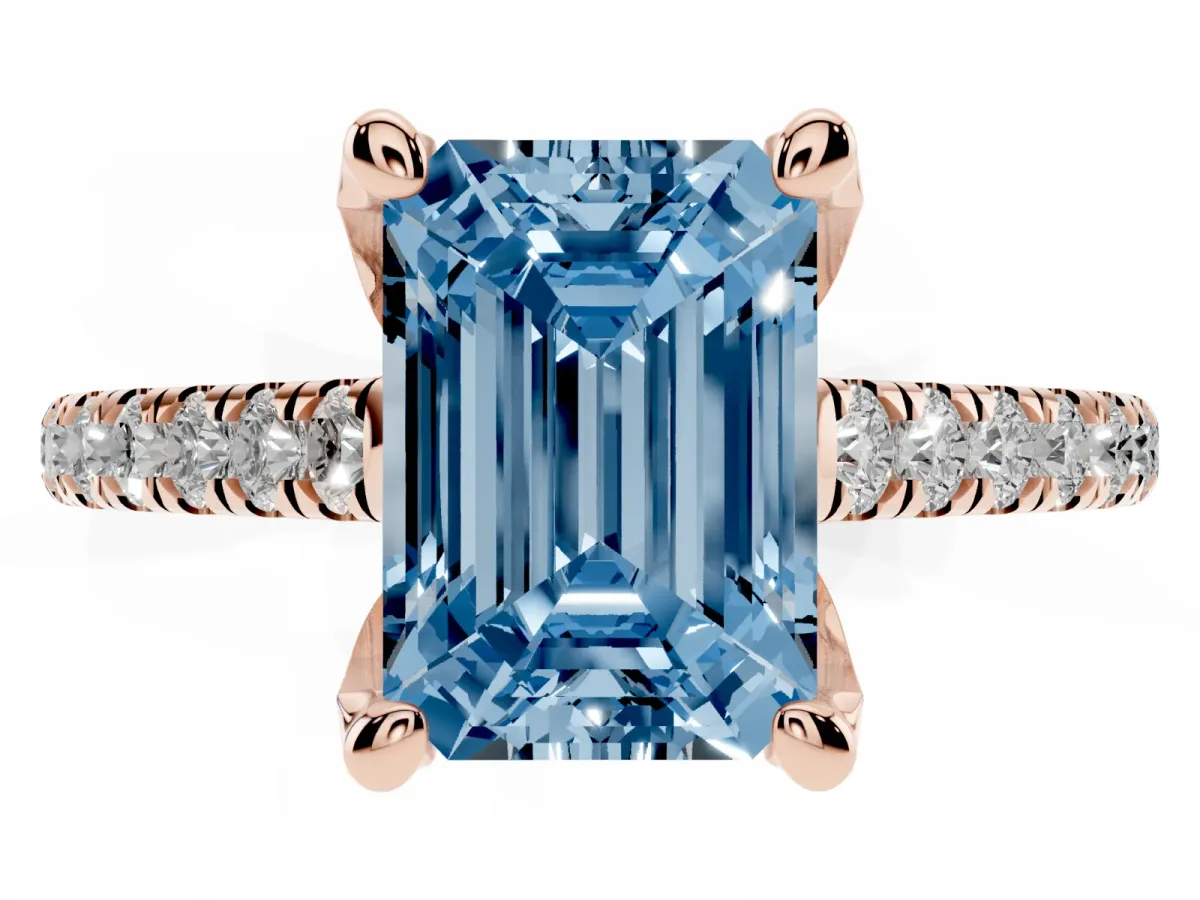 Fancy Blue Emerald Cut Brilliant Diamond Solitaire with Pavé Band and Four-Prong Setting Rose gold