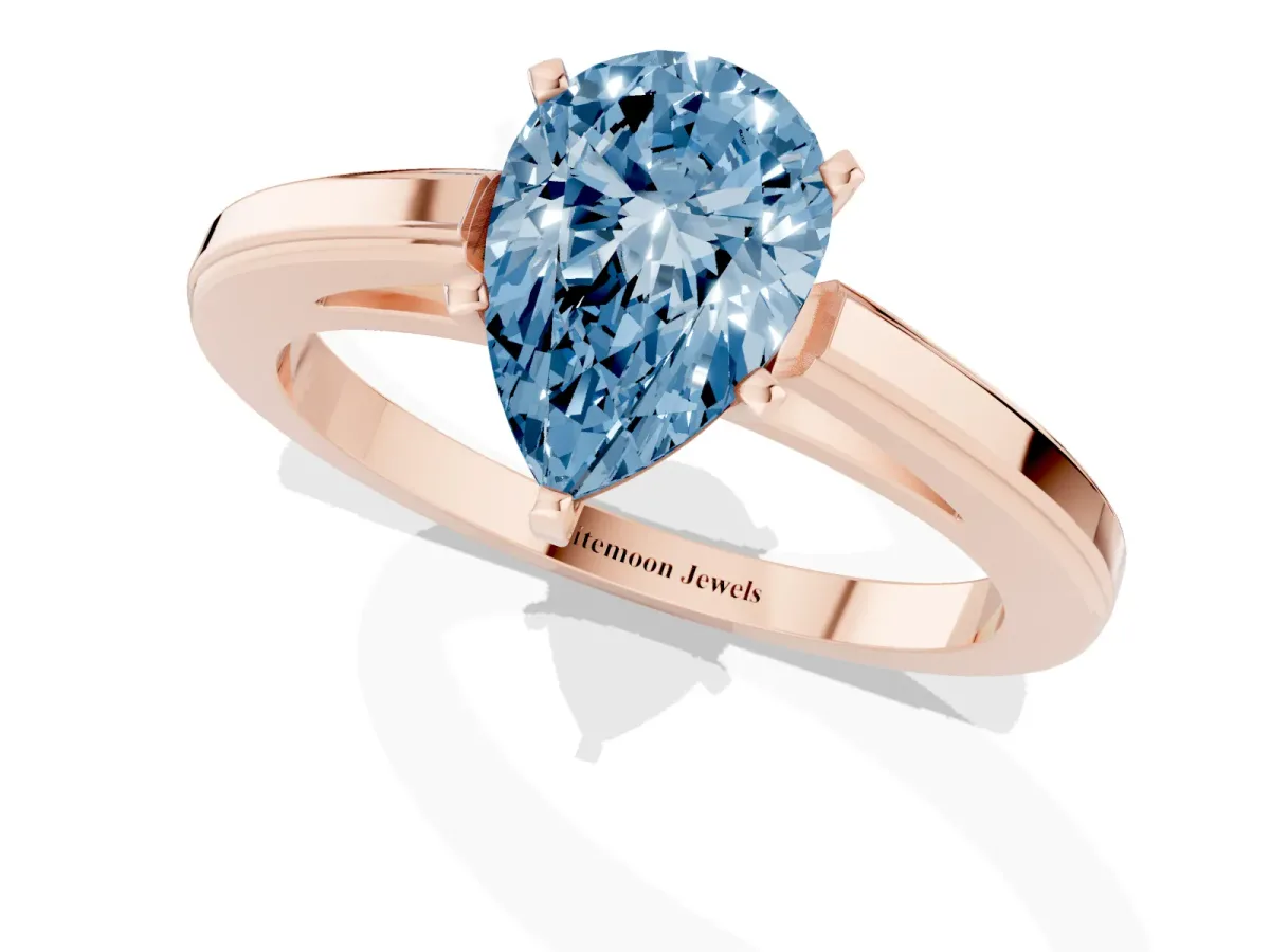Fancy Blue Pear Cut Solitaire Diamond Ring with Four-Prong Setting and Classic Band Rose gold