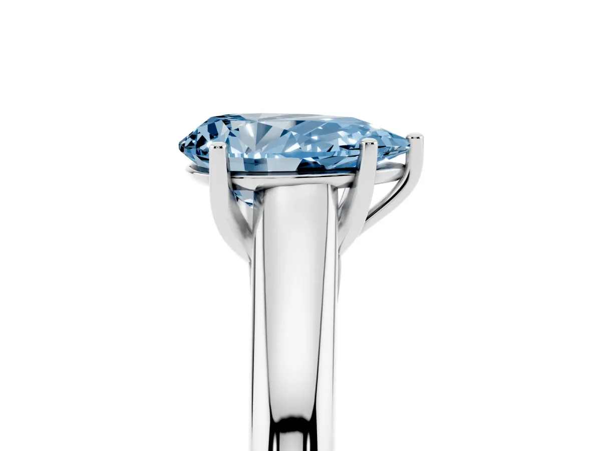 Fancy Blue Pear Cut Solitaire Engagement Ring with Tapered Band and Four-Prong Setting Platinum
