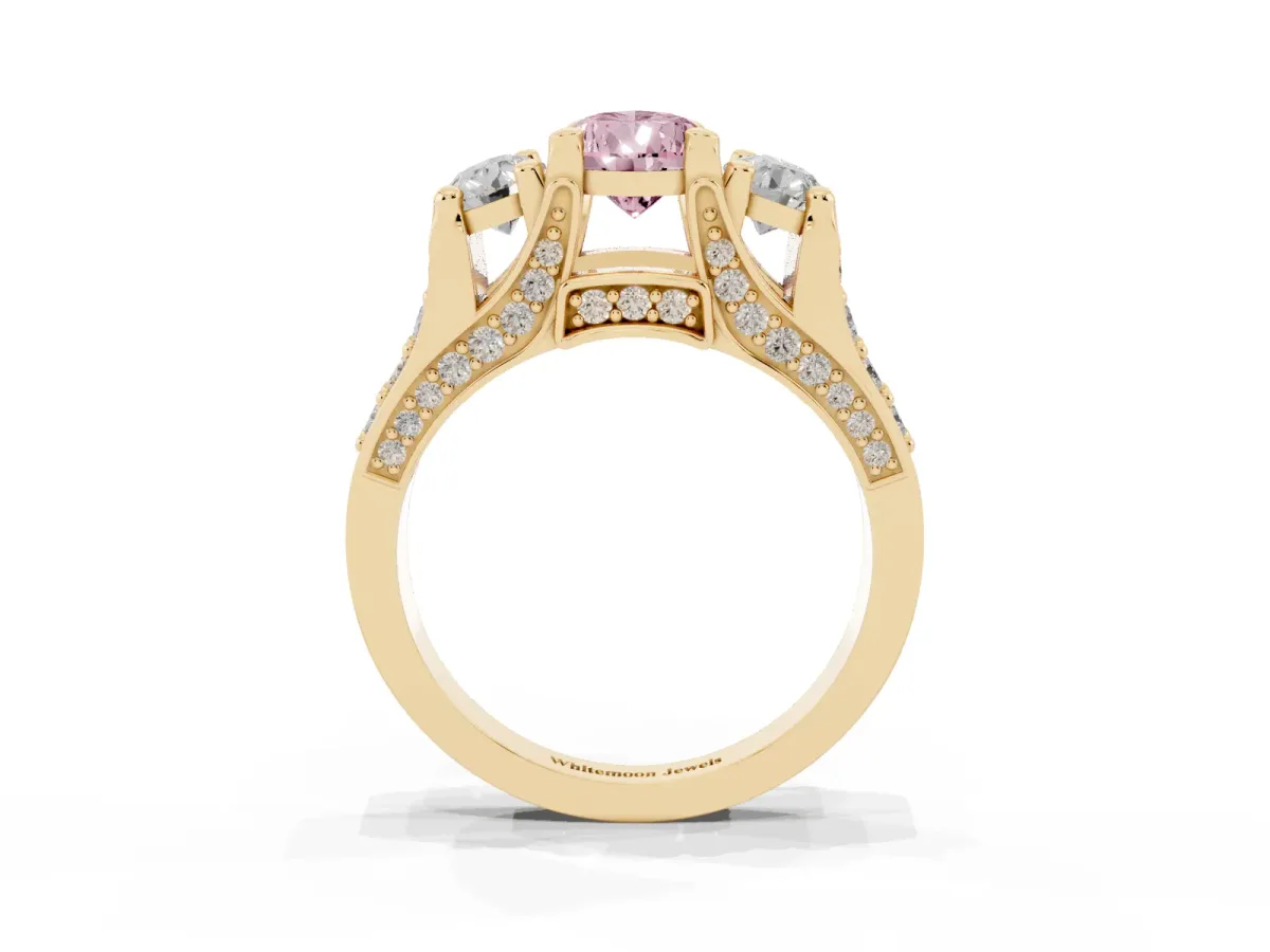 Fancy Pink Pear Cut Diamond Three-Stone Ring with Channel Set Band and Four-Prong Setting Yellow gold