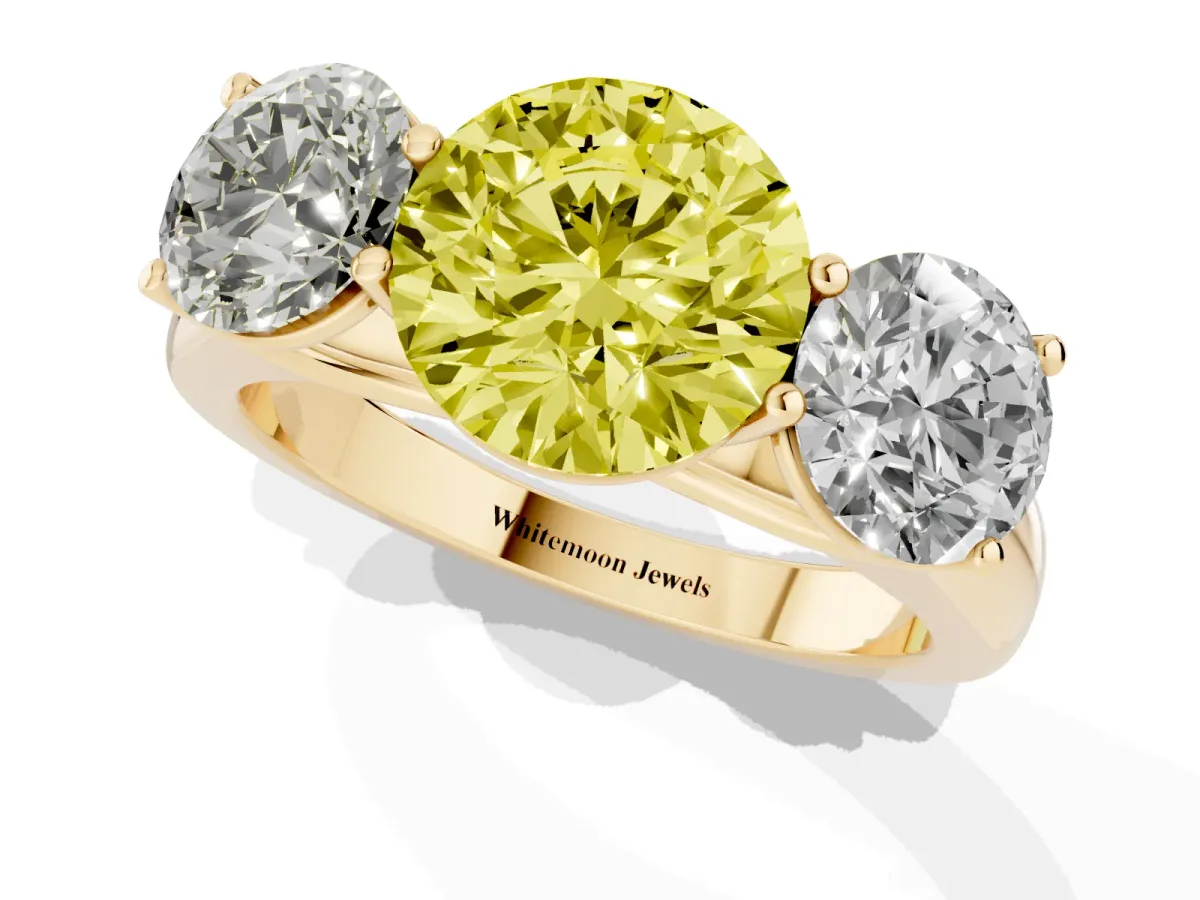 Fancy Yellow Round Cut Three-Stone Diamond Ring with Prong Setting on a Classic Band Yellow gold