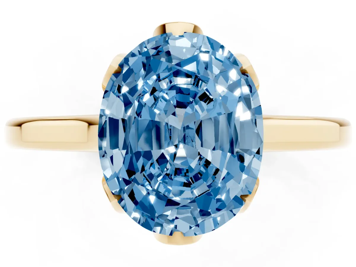 Fancy Blue Oval Cut Diamond Solitaire Ring with Flower Prong Setting and Classic Band Yellow gold